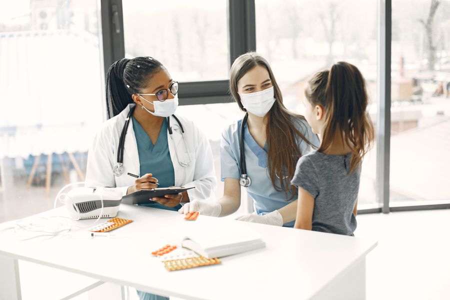Child receiving pediatric care